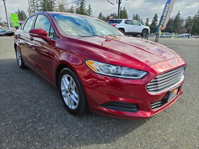 used 2016 Ford Fusion car, priced at $9,999