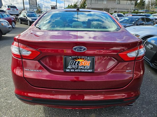 used 2016 Ford Fusion car, priced at $9,999