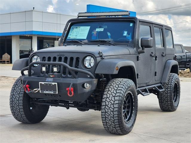 used 2015 Jeep Wrangler Unlimited car, priced at $31,250