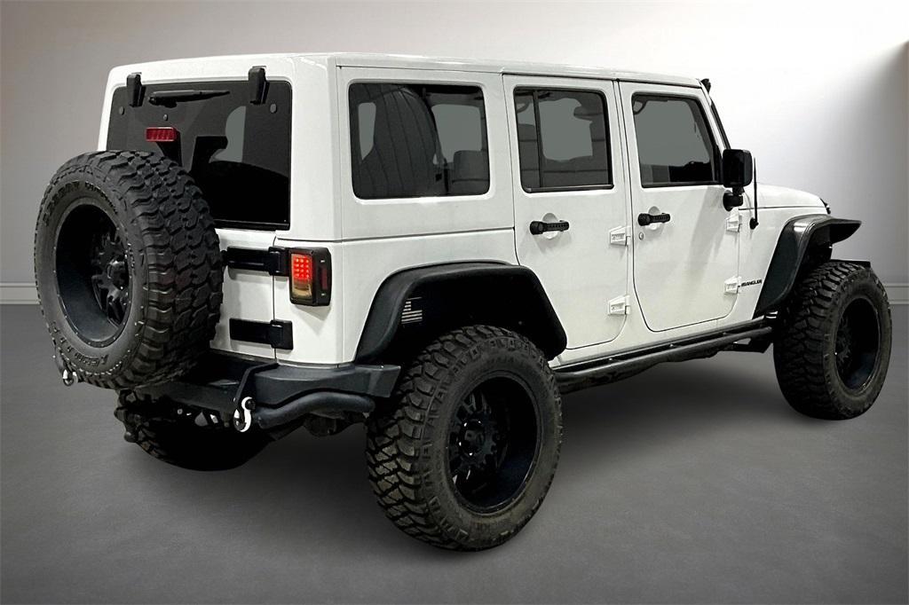 used 2016 Jeep Wrangler Unlimited car, priced at $23,500
