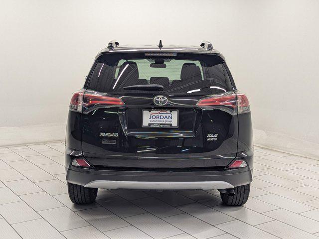 used 2018 Toyota RAV4 car, priced at $19,497