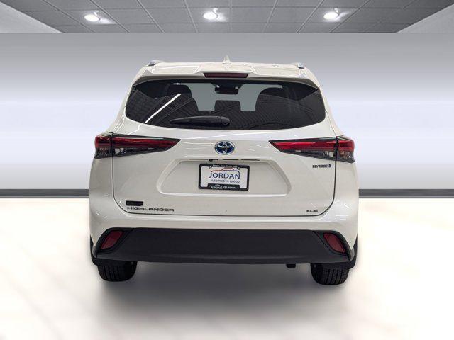 used 2021 Toyota Highlander Hybrid car, priced at $36,599
