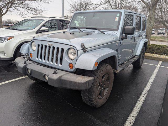 used 2012 Jeep Wrangler Unlimited car, priced at $13,999