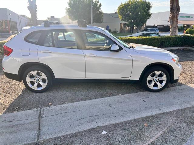 used 2013 BMW X1 car, priced at $5,999