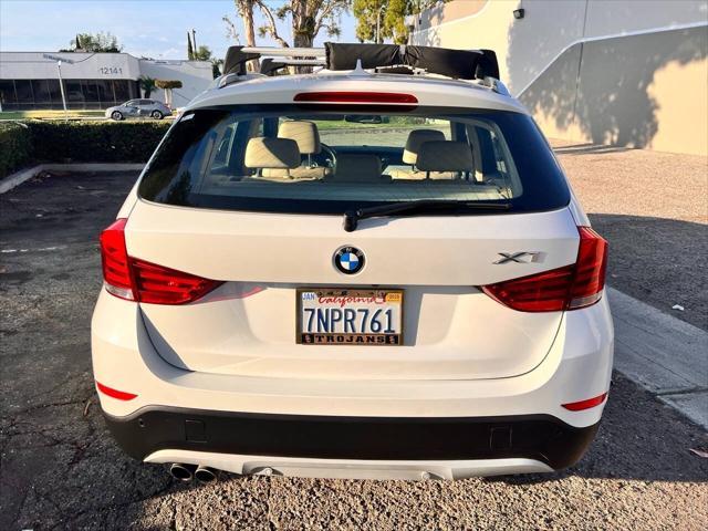 used 2013 BMW X1 car, priced at $5,999