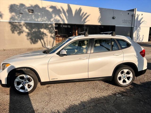 used 2013 BMW X1 car, priced at $5,999