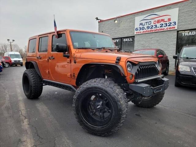 used 2011 Jeep Wrangler Unlimited car, priced at $19,470