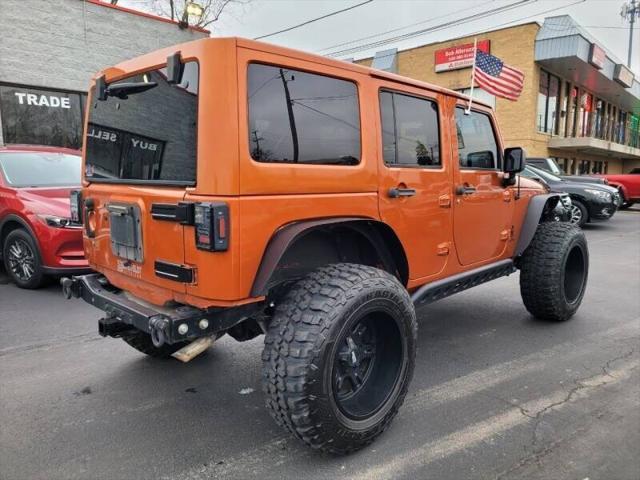 used 2011 Jeep Wrangler Unlimited car, priced at $19,470