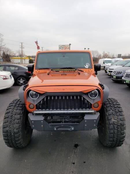 used 2011 Jeep Wrangler Unlimited car, priced at $19,470