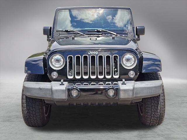 used 2018 Jeep Wrangler JK Unlimited car, priced at $25,977