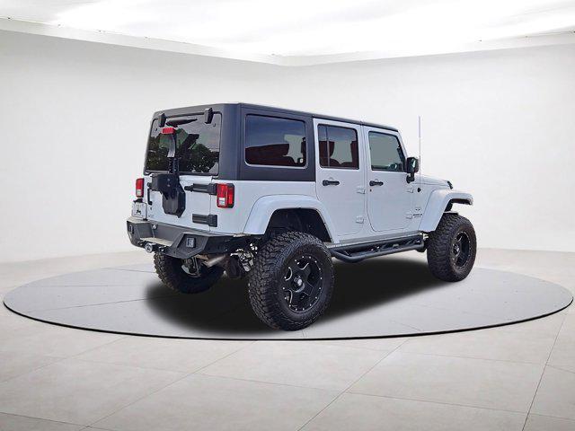 used 2016 Jeep Wrangler Unlimited car, priced at $24,877
