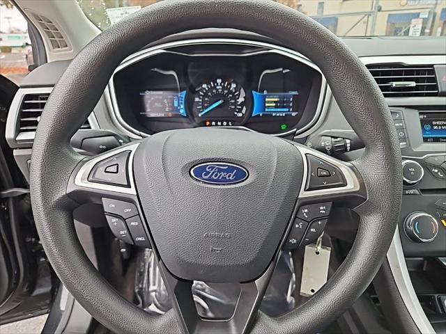 used 2015 Ford Fusion Hybrid car, priced at $13,477