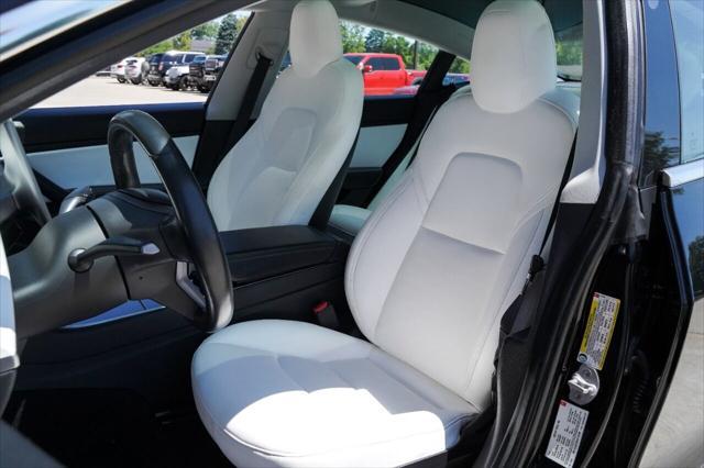 used 2018 Tesla Model 3 car, priced at $23,500