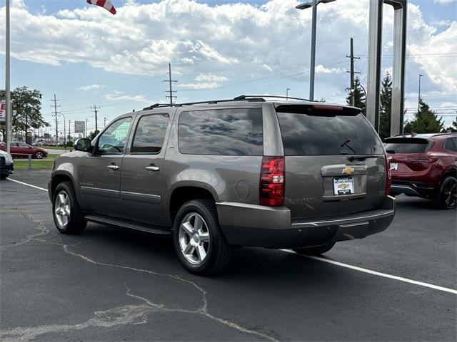 used 2011 Chevrolet Suburban car, priced at $12,000