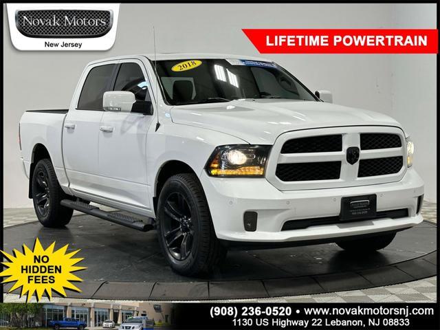 used 2018 Ram 1500 car, priced at $30,588