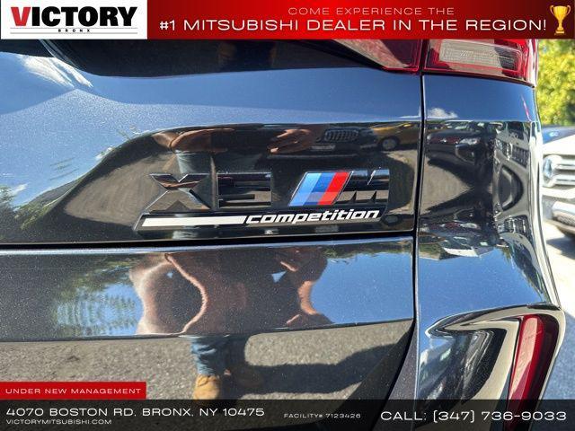used 2022 BMW X5 M car, priced at $60,646
