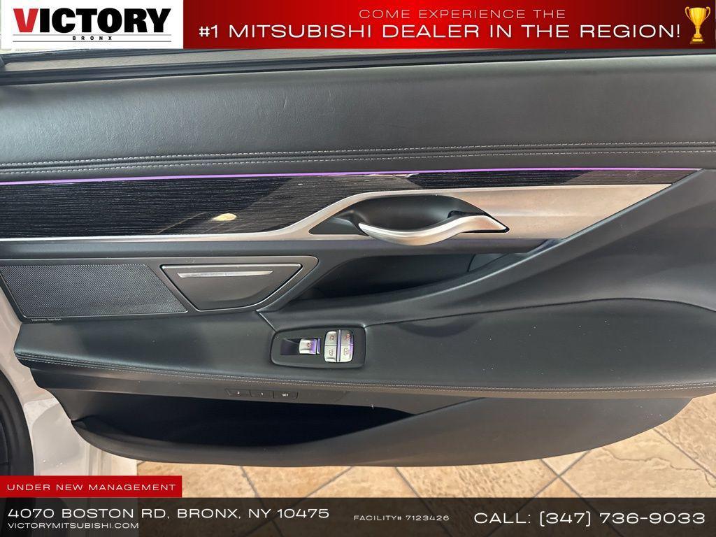 used 2022 BMW 745e car, priced at $41,235