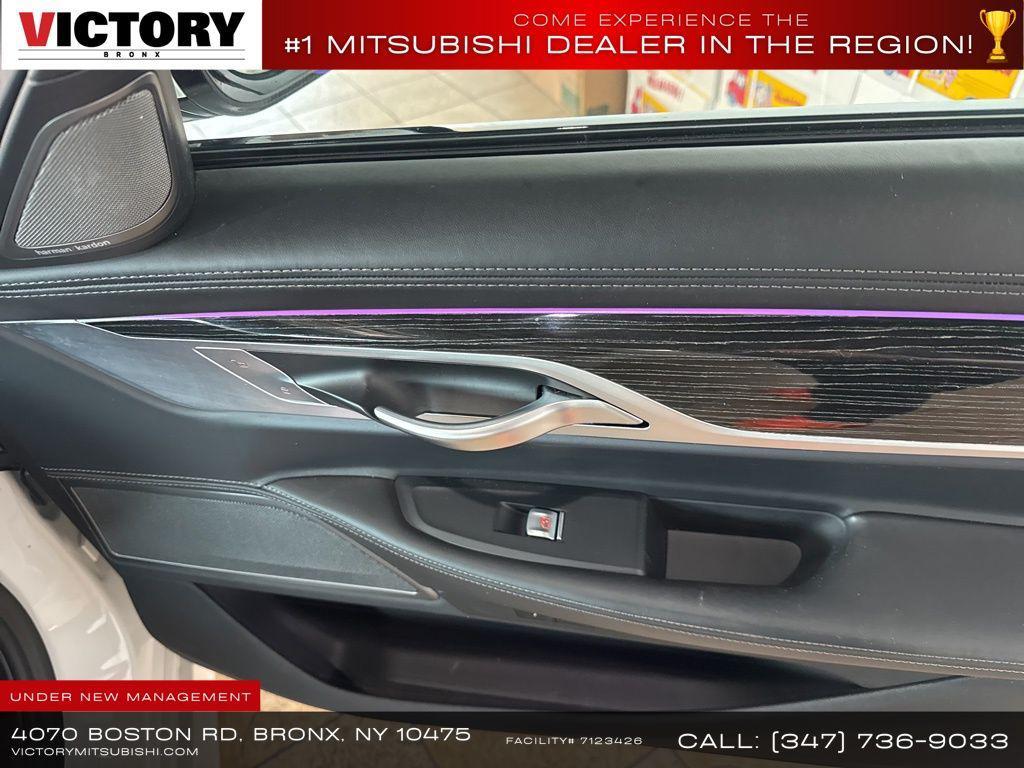 used 2022 BMW 745e car, priced at $41,235