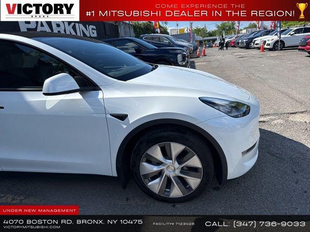 used 2023 Tesla Model Y car, priced at $27,000