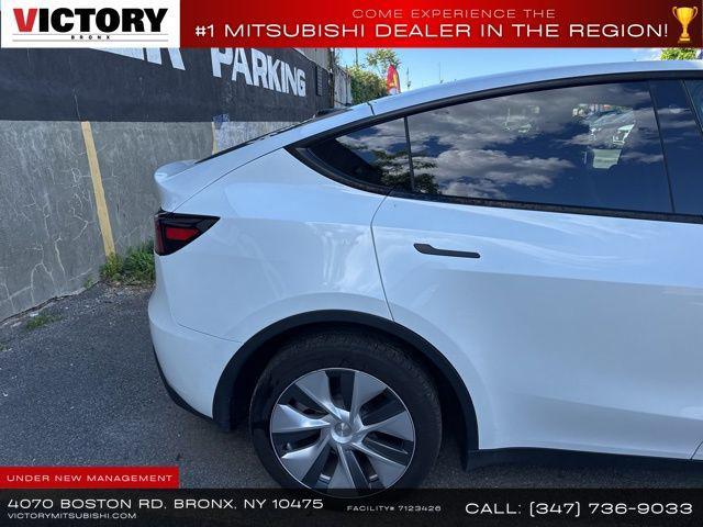 used 2023 Tesla Model Y car, priced at $27,000