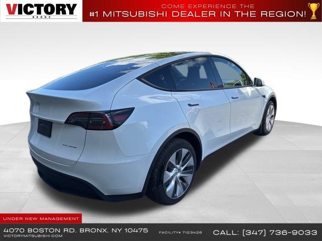 used 2023 Tesla Model Y car, priced at $27,000