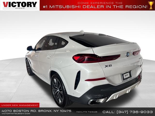 used 2023 BMW X6 car, priced at $44,156