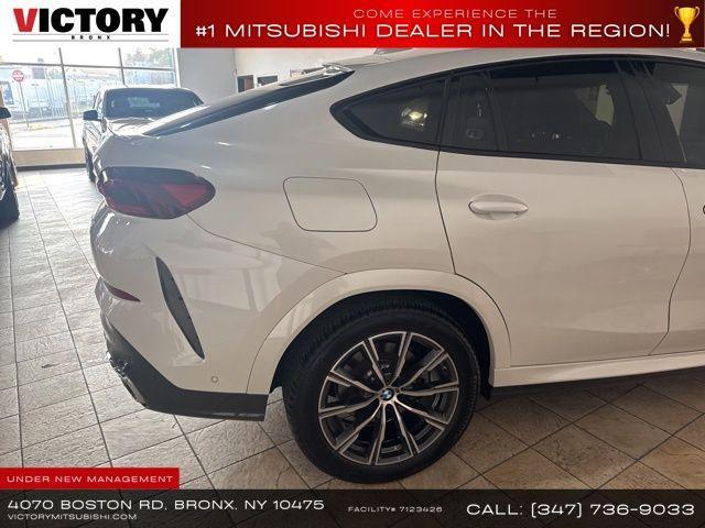 used 2023 BMW X6 car, priced at $44,156