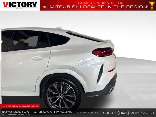 used 2023 BMW X6 car, priced at $44,156