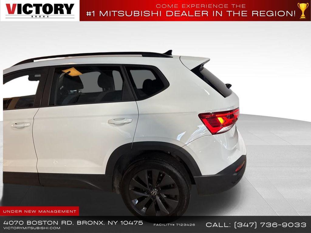 used 2023 Volkswagen Taos car, priced at $13,856