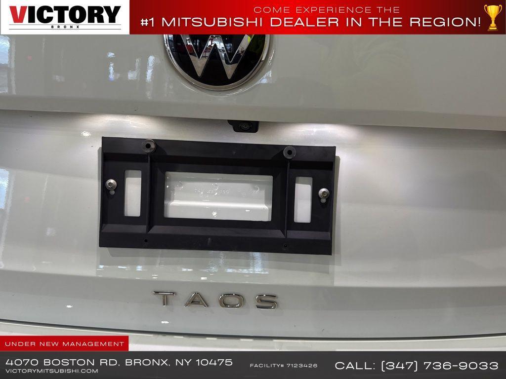used 2023 Volkswagen Taos car, priced at $13,856