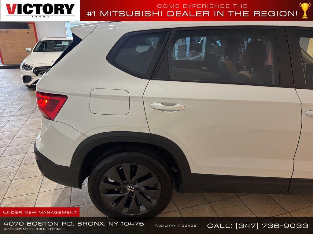 used 2023 Volkswagen Taos car, priced at $13,856