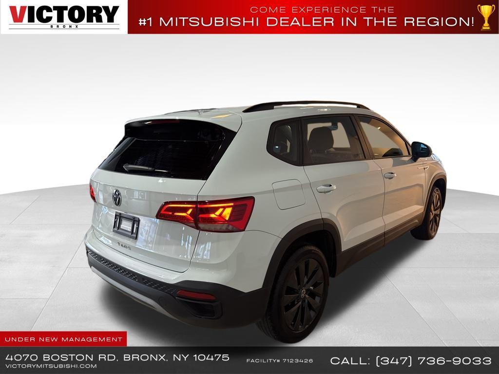 used 2023 Volkswagen Taos car, priced at $13,856