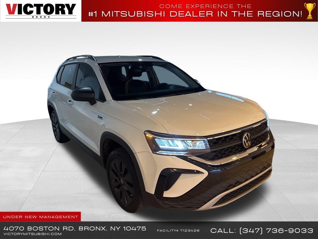 used 2023 Volkswagen Taos car, priced at $13,856