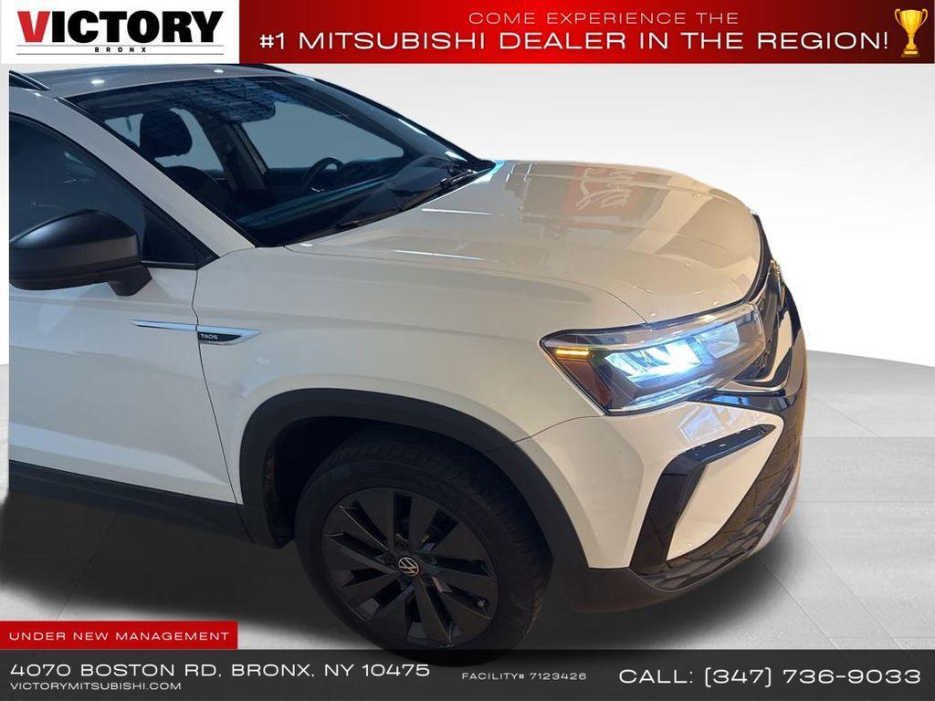 used 2023 Volkswagen Taos car, priced at $13,856