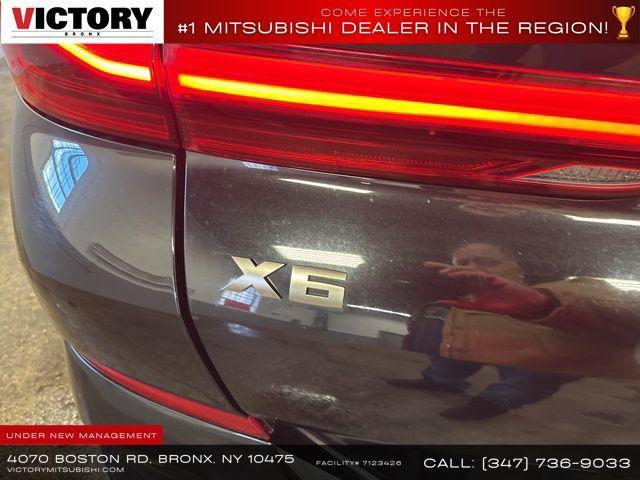 used 2022 BMW X6 car, priced at $54,517
