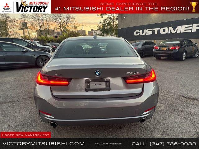 used 2024 BMW 330e car, priced at $30,801