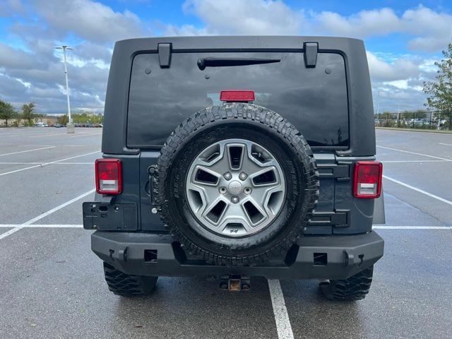 used 2016 Jeep Wrangler Unlimited car, priced at $22,899