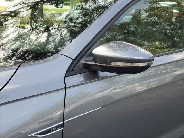 used 2021 Volkswagen Passat car, priced at $22,000