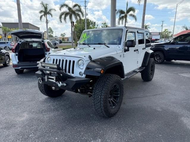 used 2014 Jeep Wrangler Unlimited car, priced at $21,990