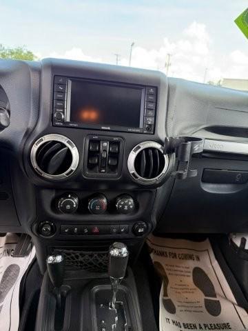 used 2014 Jeep Wrangler Unlimited car, priced at $21,990