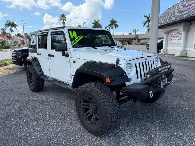 used 2014 Jeep Wrangler Unlimited car, priced at $21,990