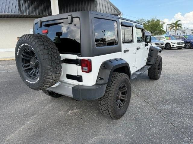 used 2014 Jeep Wrangler Unlimited car, priced at $21,990