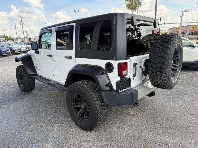 used 2014 Jeep Wrangler Unlimited car, priced at $21,990
