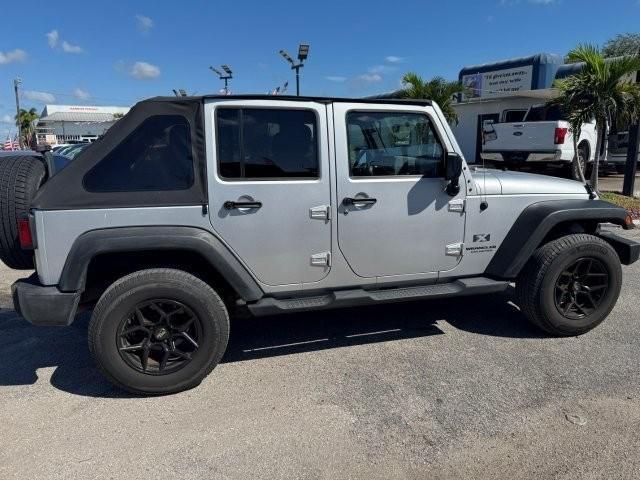 used 2009 Jeep Wrangler Unlimited car, priced at $14,990