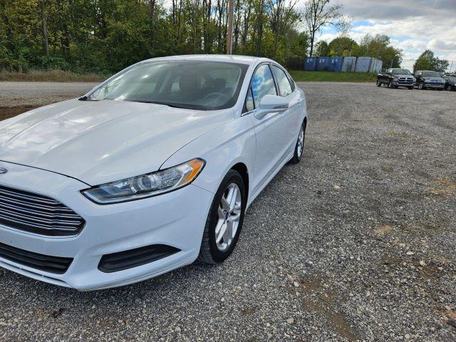 used 2016 Ford Fusion car, priced at $6,052