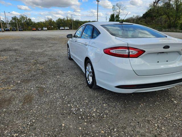 used 2016 Ford Fusion car, priced at $6,052