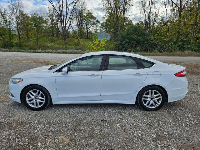 used 2016 Ford Fusion car, priced at $6,052