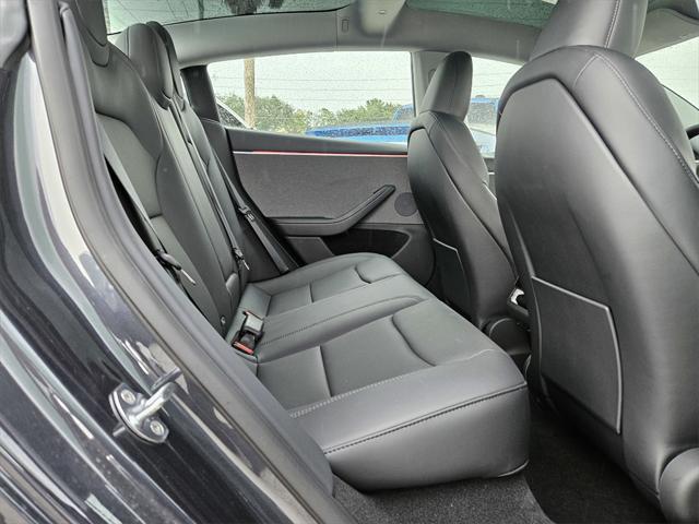 used 2025 Tesla Model 3 car, priced at $36,991
