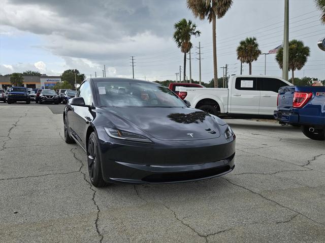 used 2025 Tesla Model 3 car, priced at $36,991