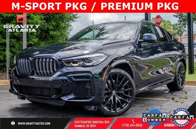 used 2023 BMW X6 car, priced at $58,995